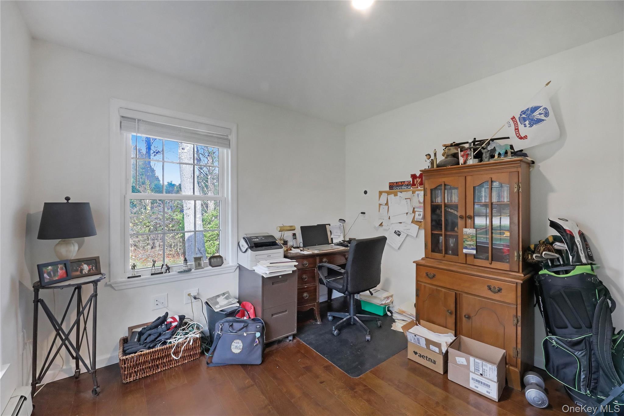 48 Nidzyn Avenue Remsenburg, NY 11960 - Photo 26 of 43 a view of a workspace with furniture and a window