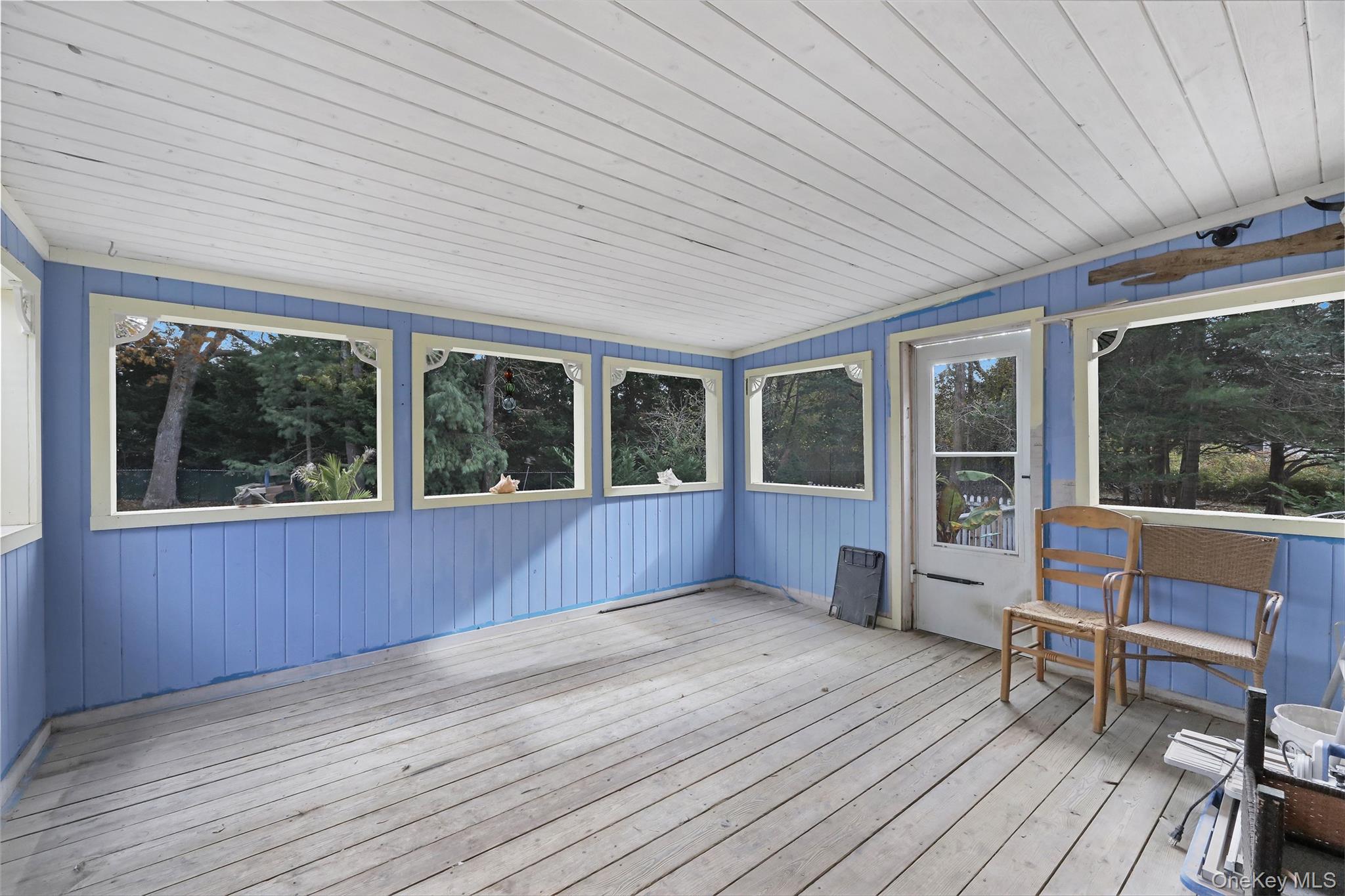 48 Nidzyn Avenue Remsenburg, NY 11960 - Photo 33 of 43 a house with wooden floor and outdoor space