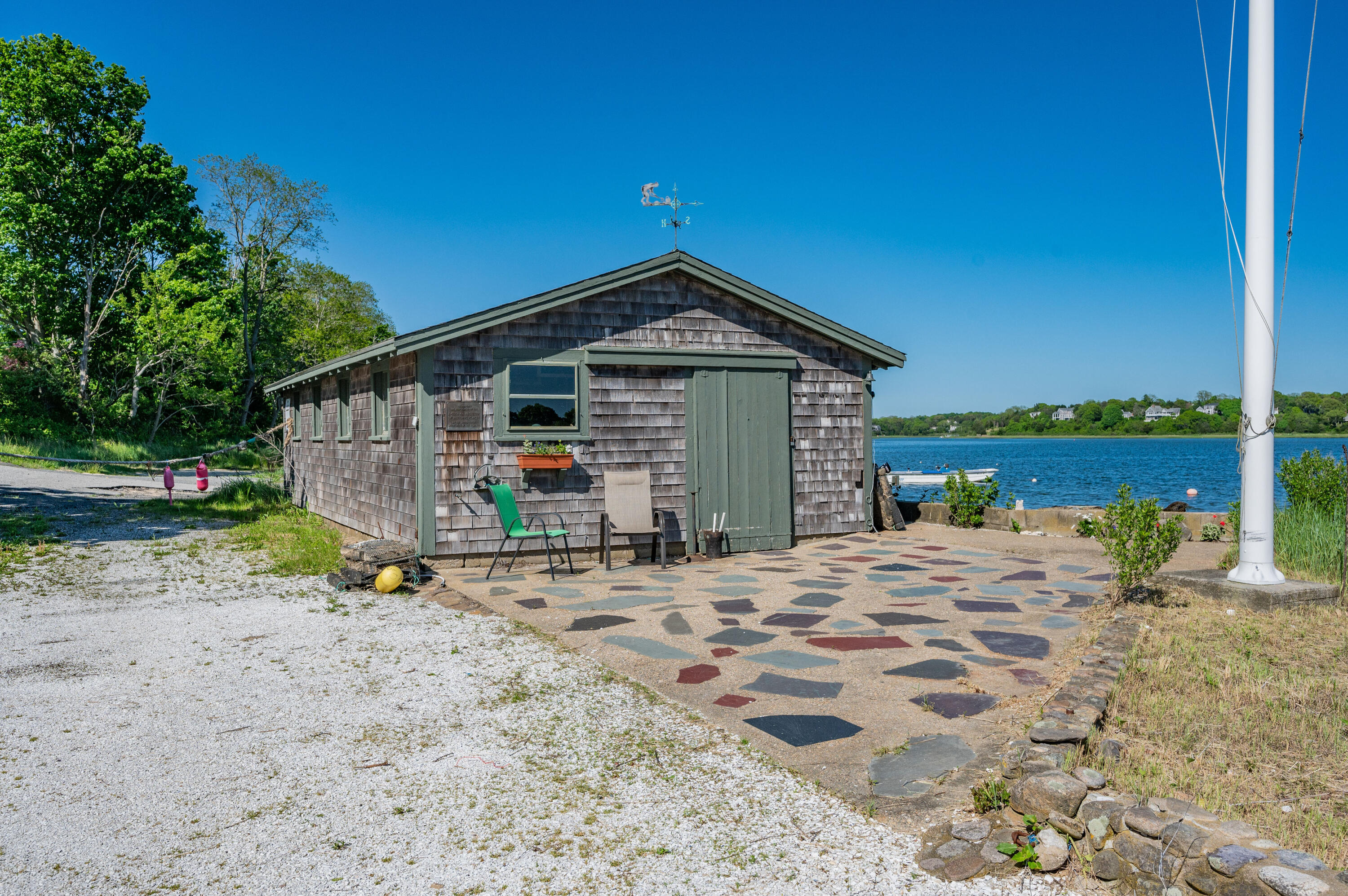 150 State Highway Eastham, MA 02642 - Photo 16 of 45 a front view of a house with a yard