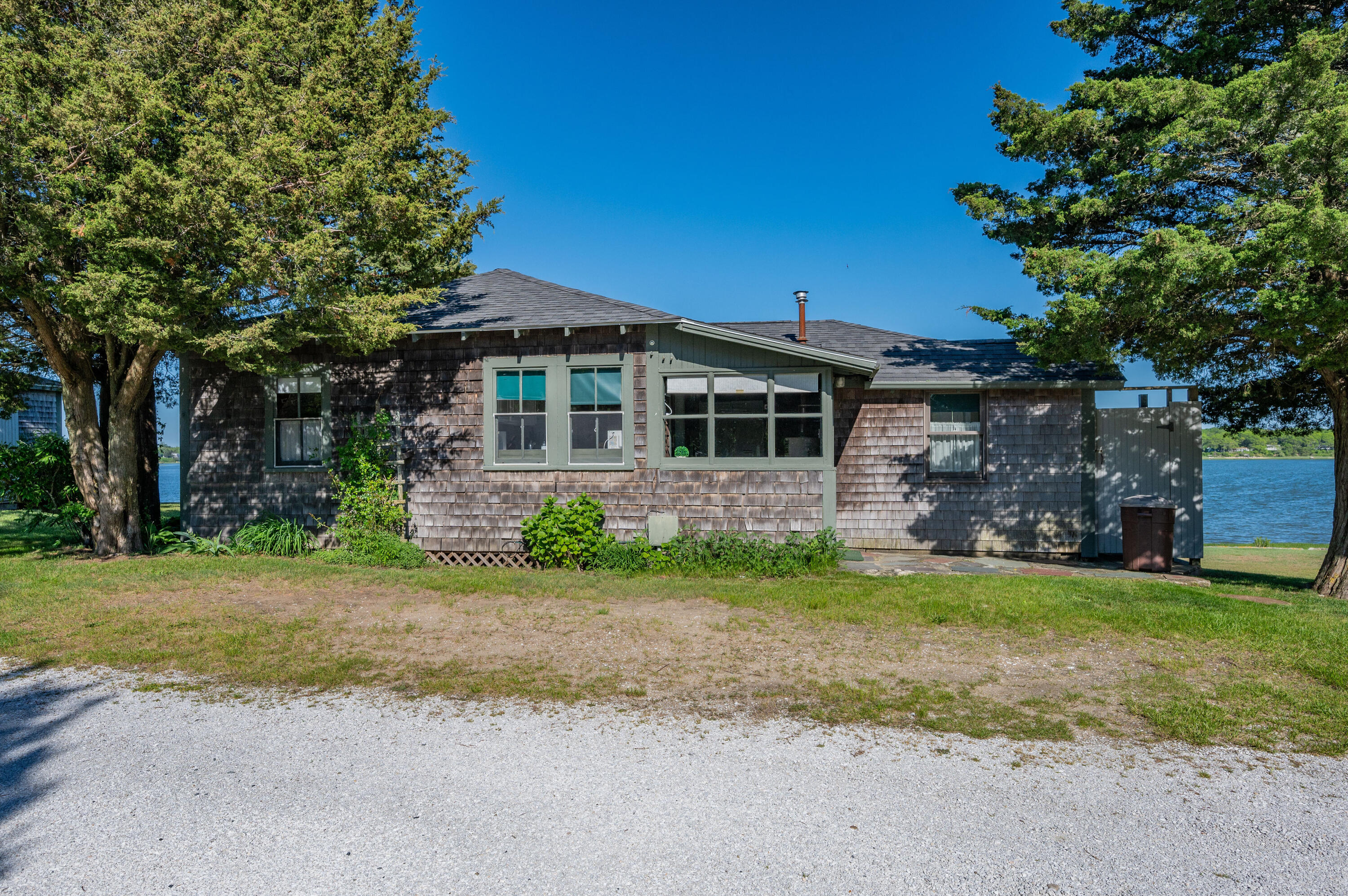 150 State Highway Eastham, MA 02642 - Photo 25 of 45 a view of a house with a yard