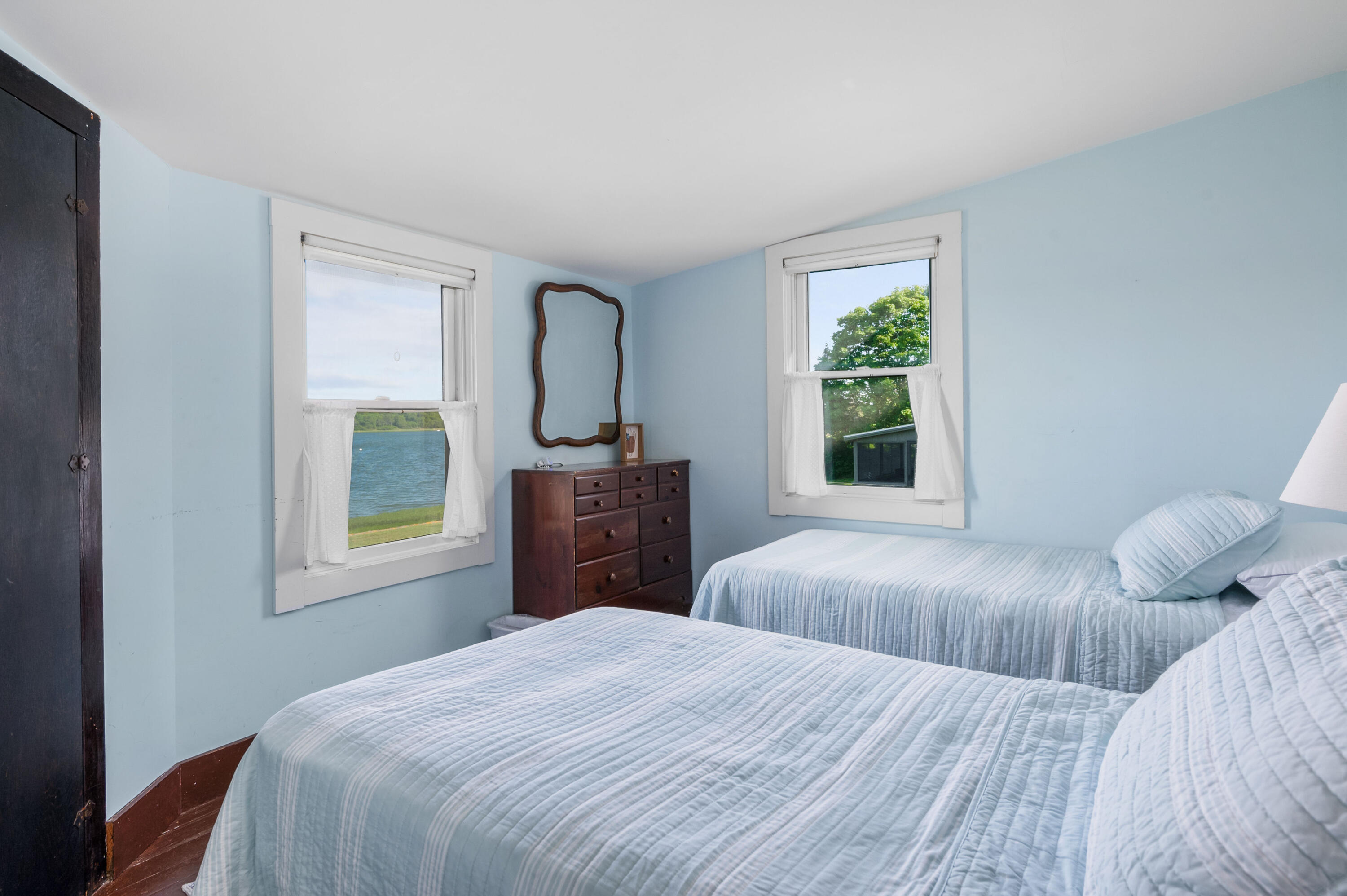 150 State Highway Eastham, MA 02642 - Photo 28 of 45 a bedroom with a bed window and a window