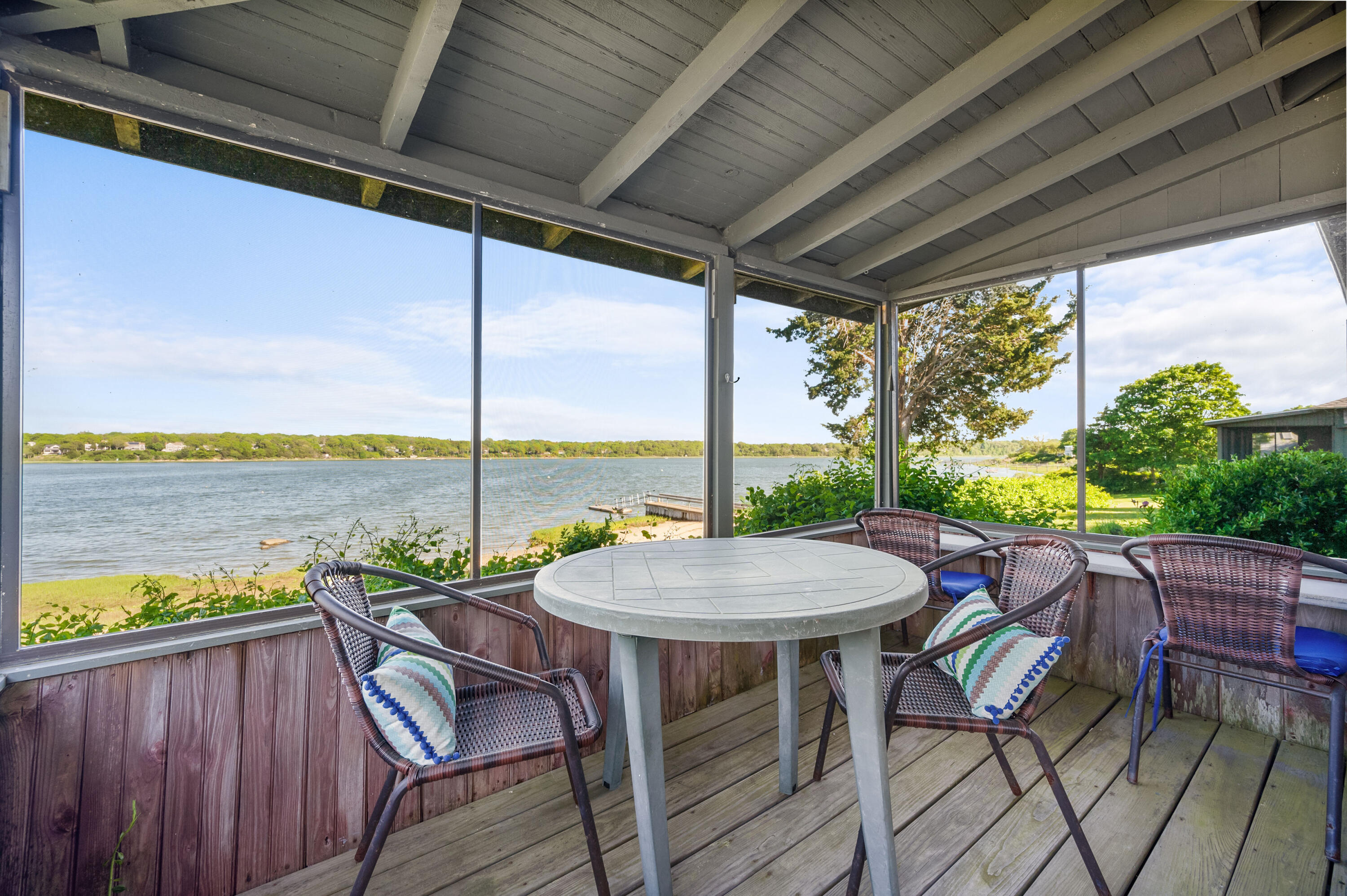 150 State Highway Eastham, MA 02642 - Photo 33 of 45 a view of chairs and table in the balcony