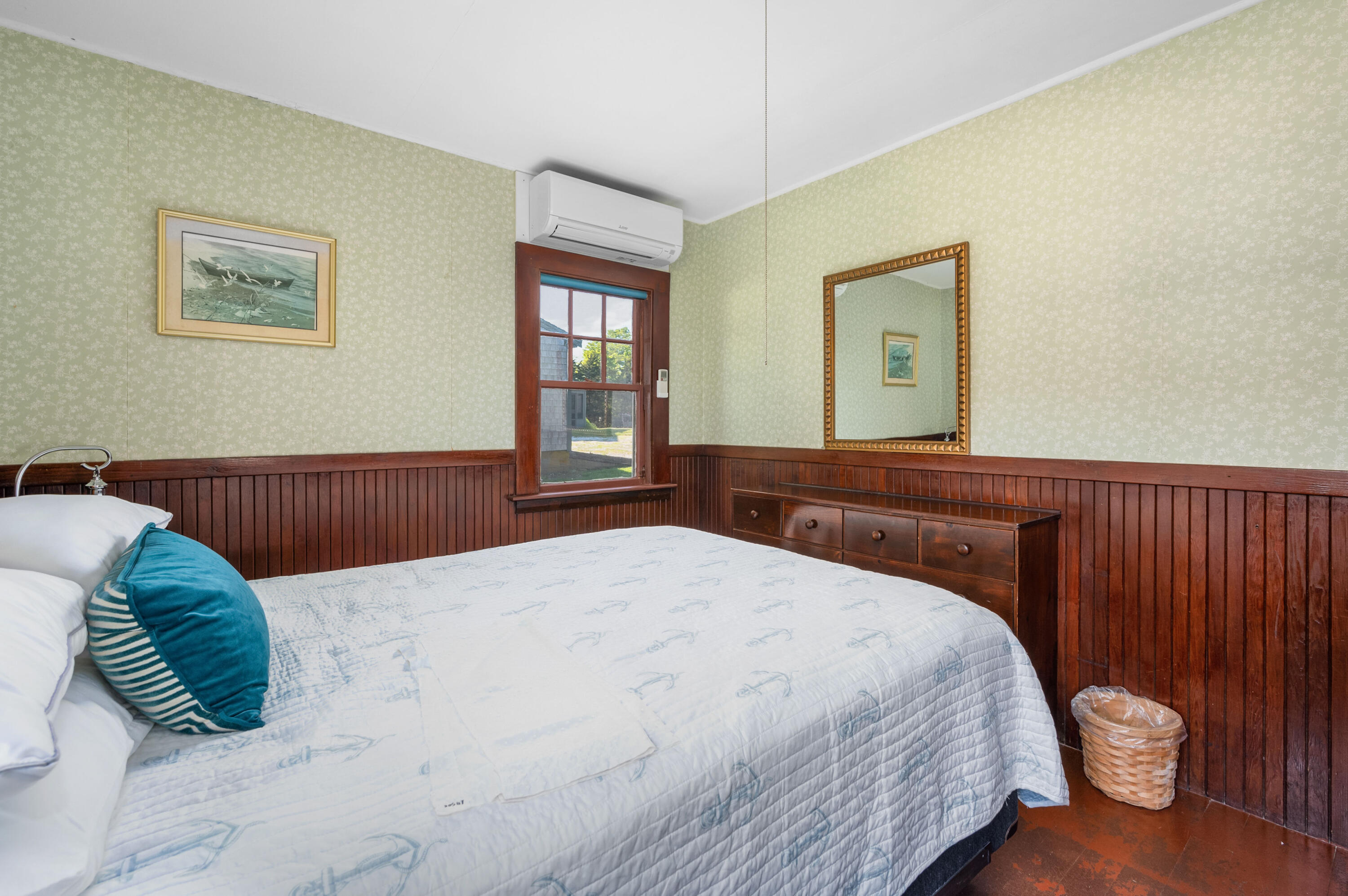 150 State Highway Eastham, MA 02642 - Photo 35 of 45 a bedroom with a bed and a window