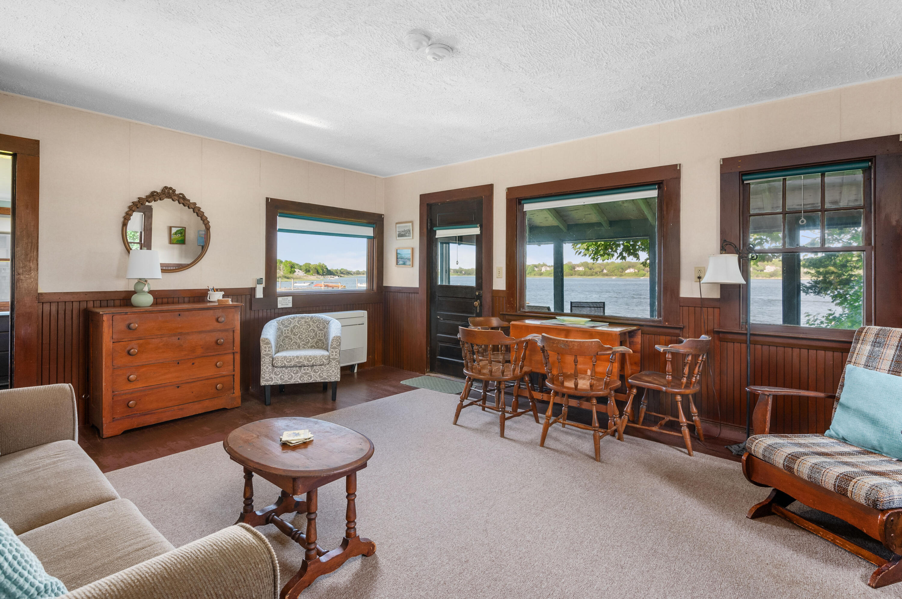 150 State Highway Eastham, MA 02642 - Photo 36 of 45 a living room with furniture and a large window