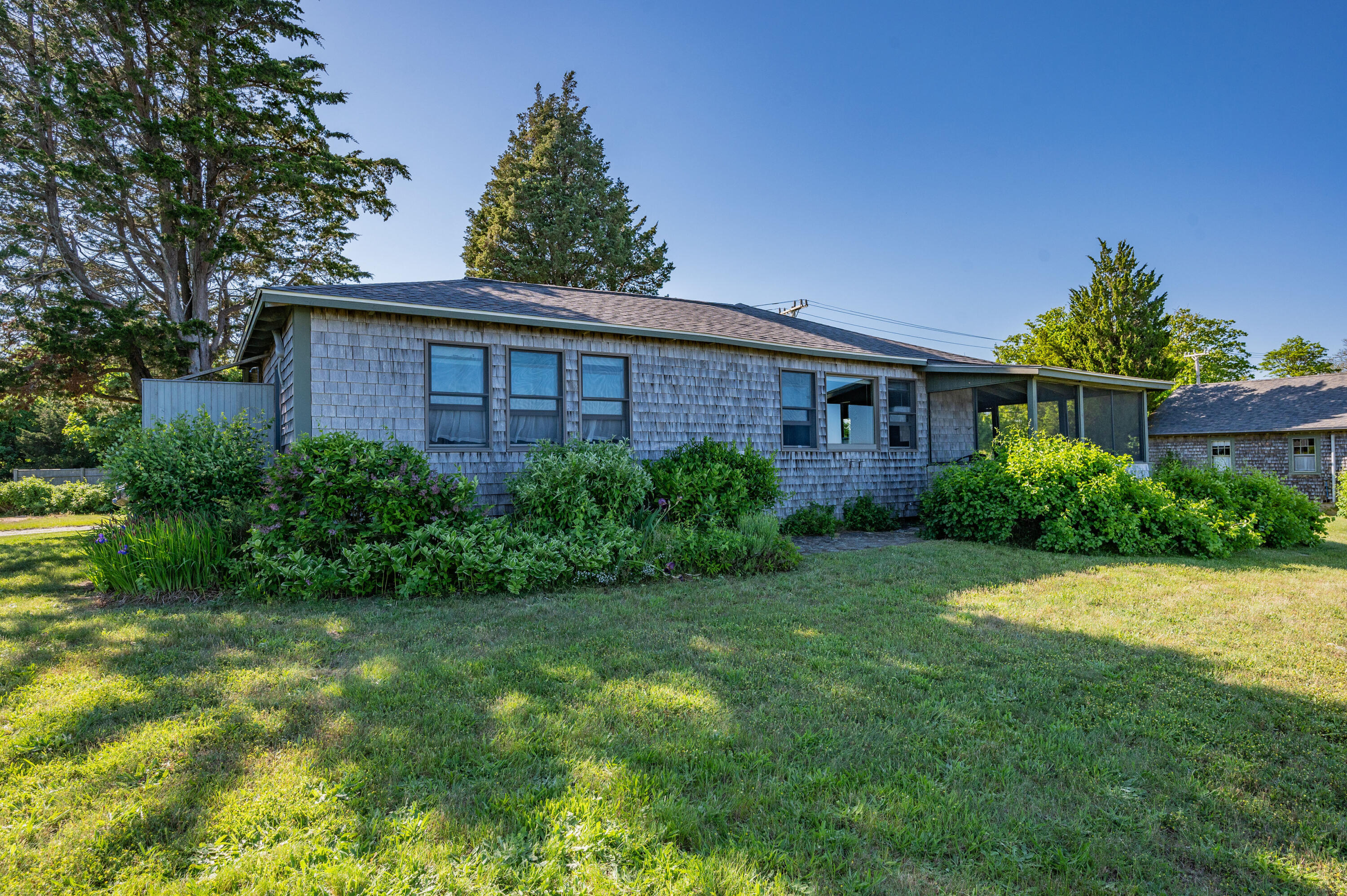 150 State Highway Eastham, MA 02642 - Photo 38 of 45 a view of a back yard of the house