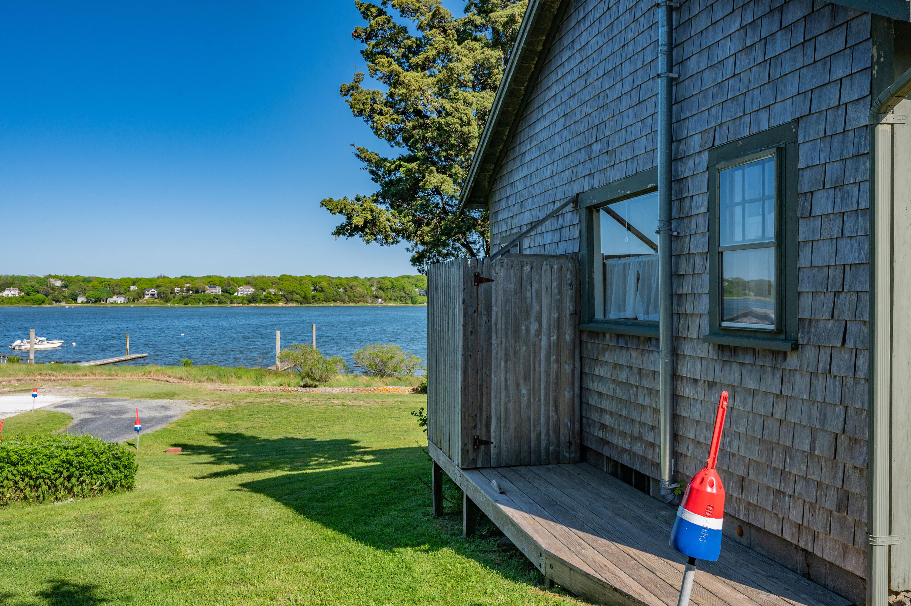 150 State Highway Eastham, MA 02642 - Photo 39 of 45 a view of a house with a yard