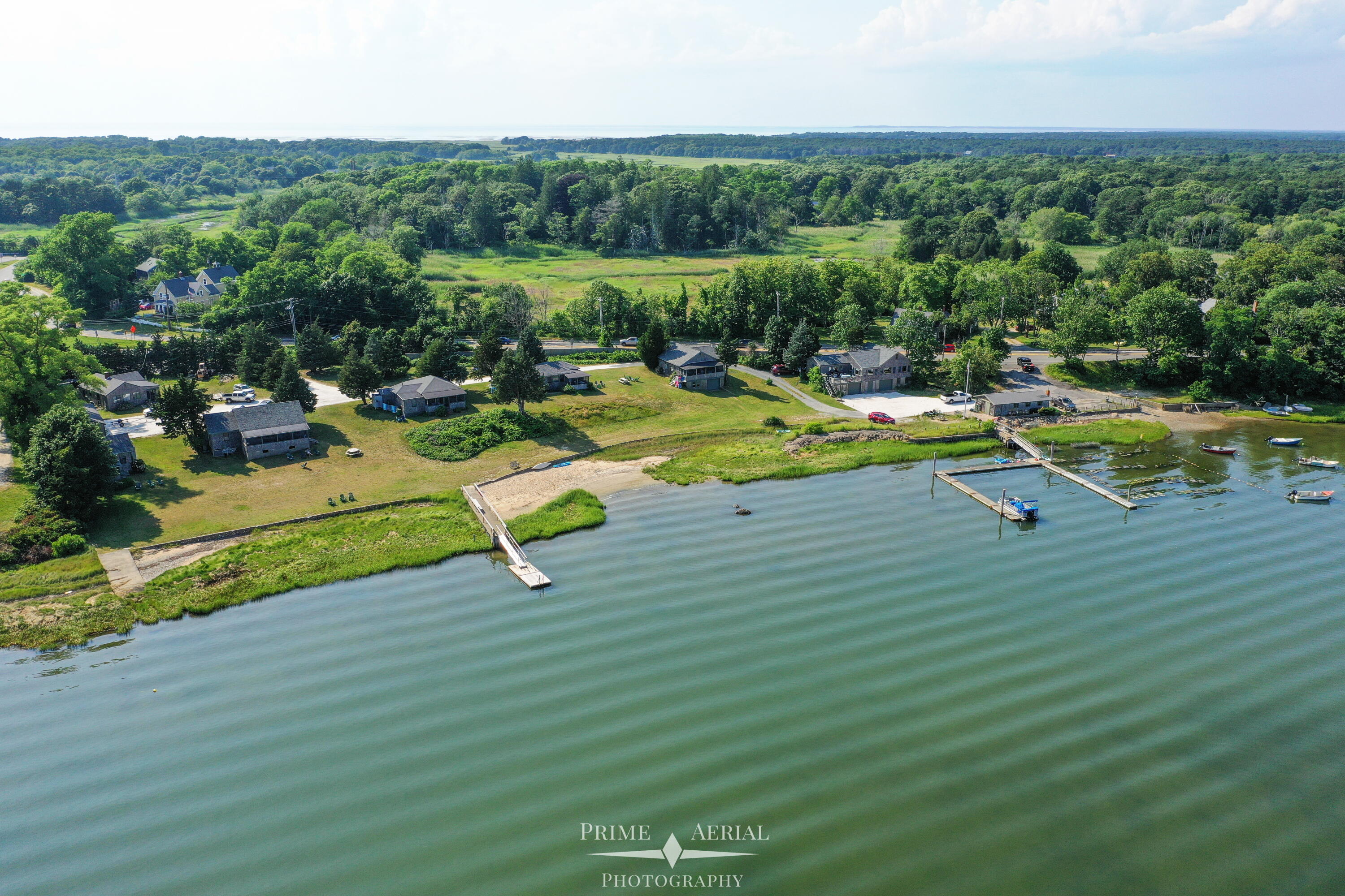 150 State Highway Eastham, MA 02642 - Photo 45 of 45 a view of a swimming pool with a patio and a yard