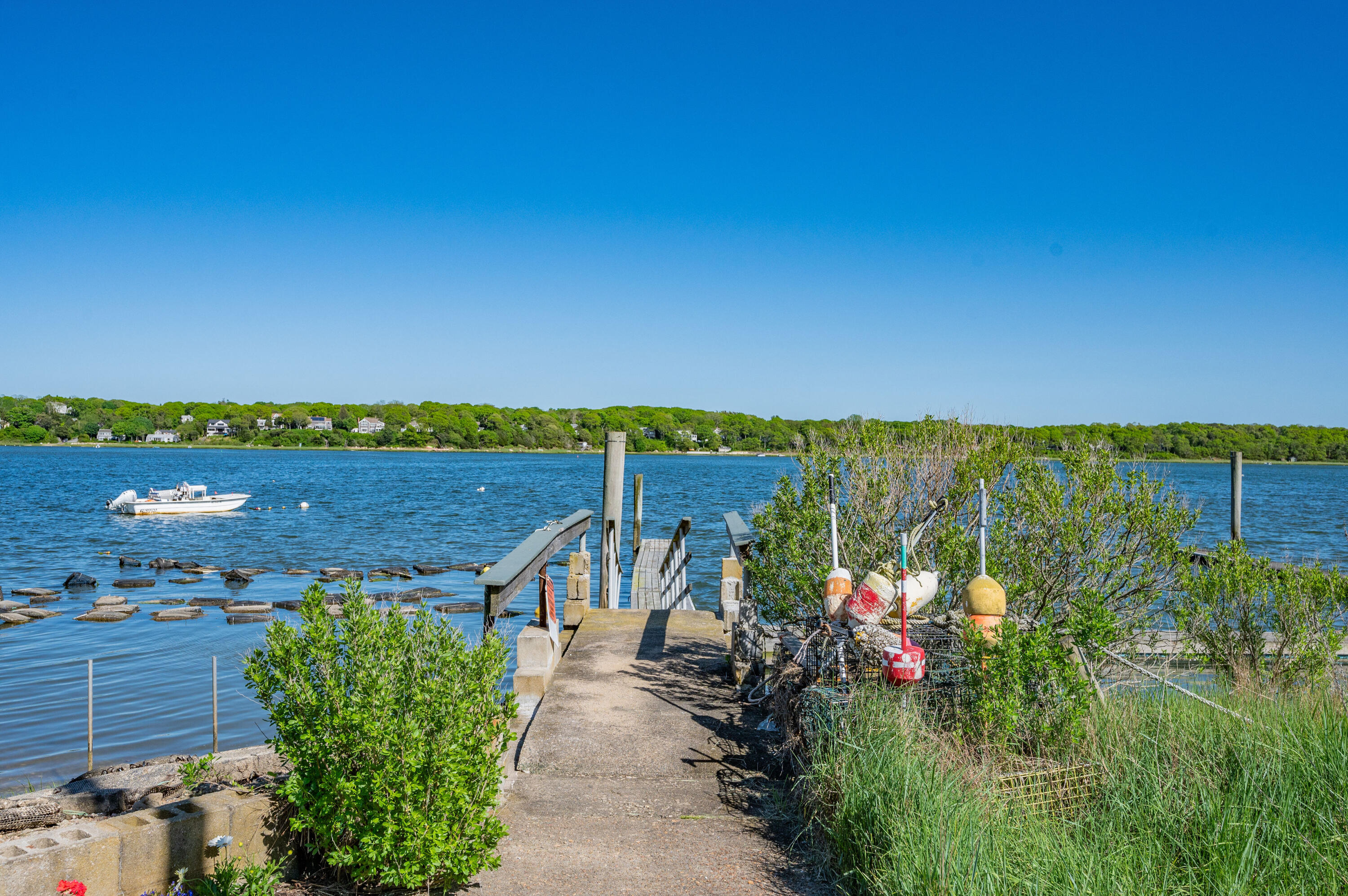 150 State Highway Eastham, MA 02642 - Photo 5 of 45 a view of a garden with a building in the back