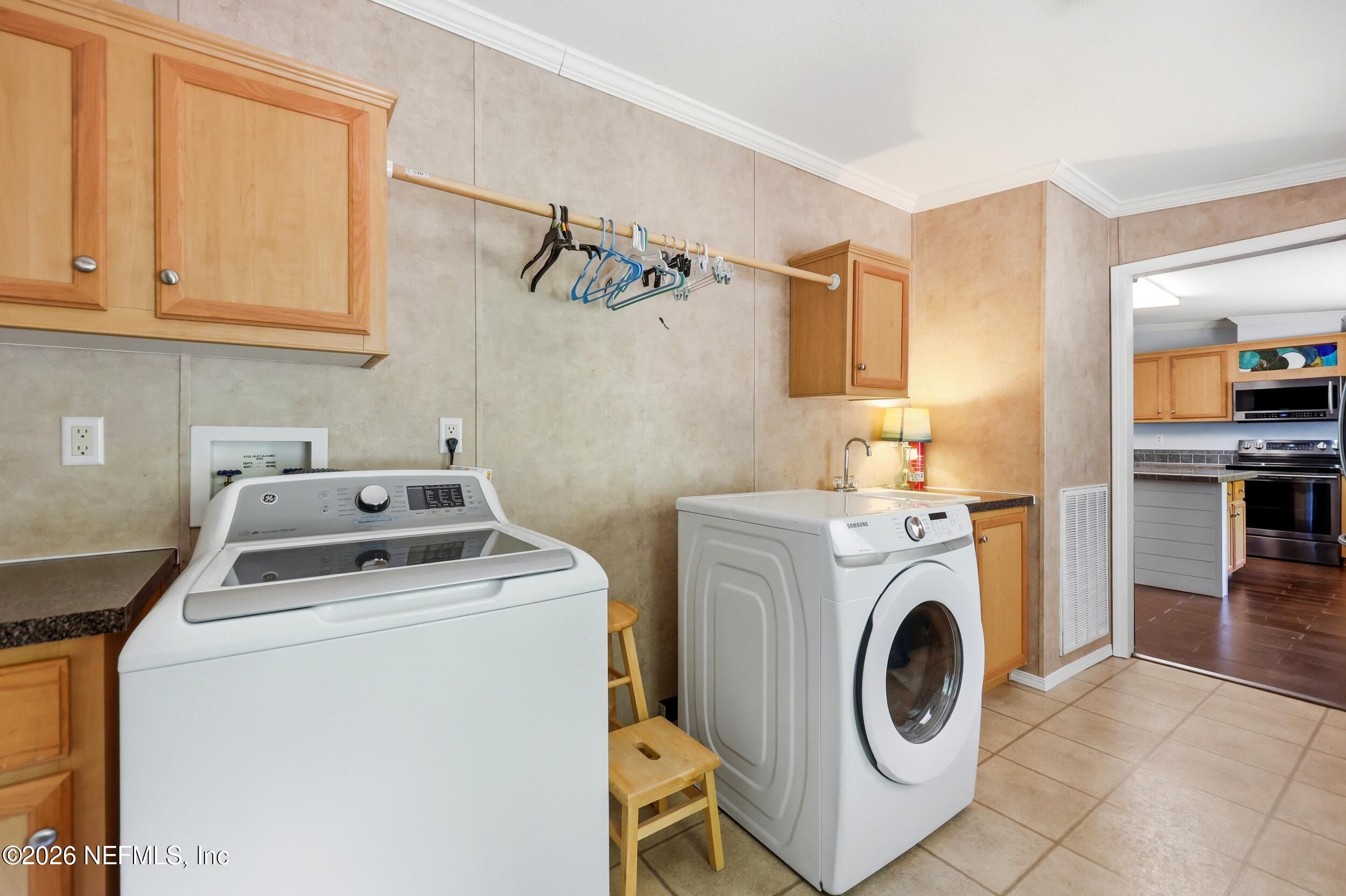 11920 Acosta Road Jacksonville, FL 32223 - Photo 19 of 47 Laundry Room