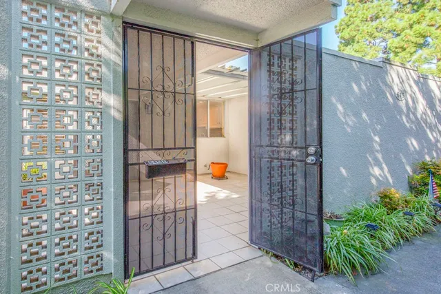 a view of a hallway with seating area