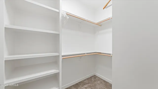 a view of a bathroom with a toilet and a view of bathroom