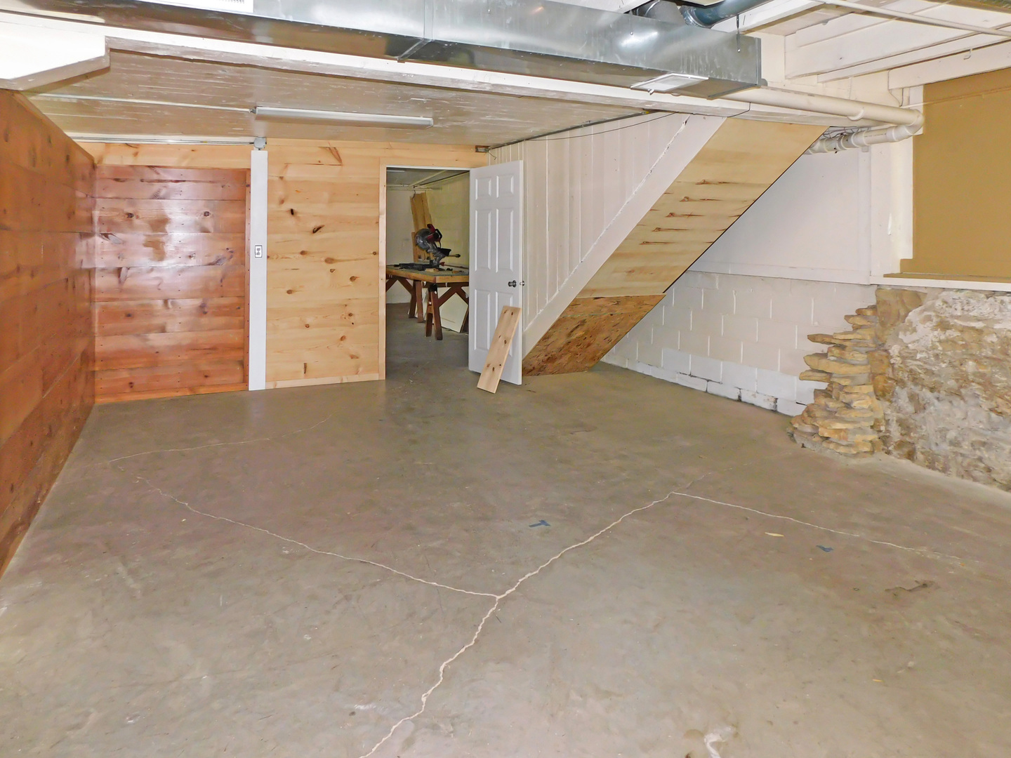 122 South Prairie Street, Unit 3 Rockton, IL 61072 - Photo 13 of 15 a view of an empty room with wooden floor
