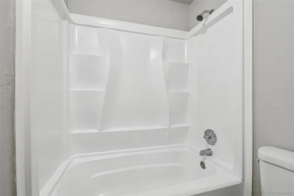 a view of a yard with a snow on the road