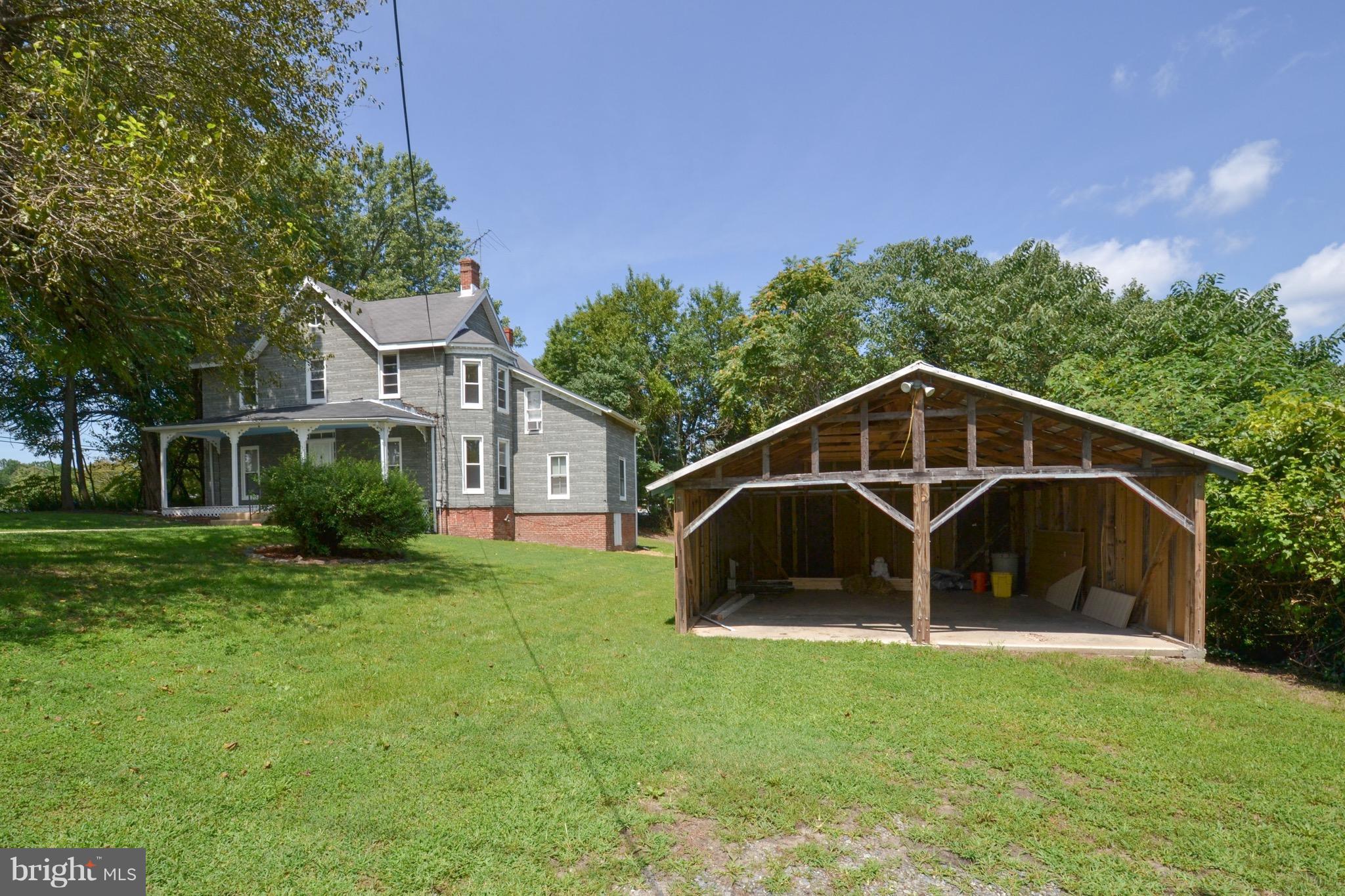 374 Jewell Road Dunkirk, MD 20754 - Photo 3 of 25 a front view of a house with garden