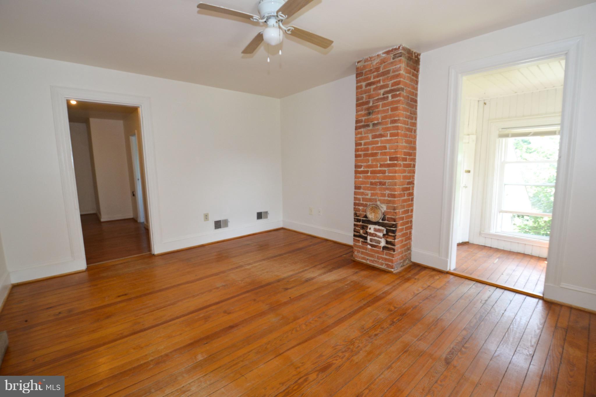 374 Jewell Road Dunkirk, MD 20754 - Photo 21 of 25 a view of an empty room with window and wooden floor