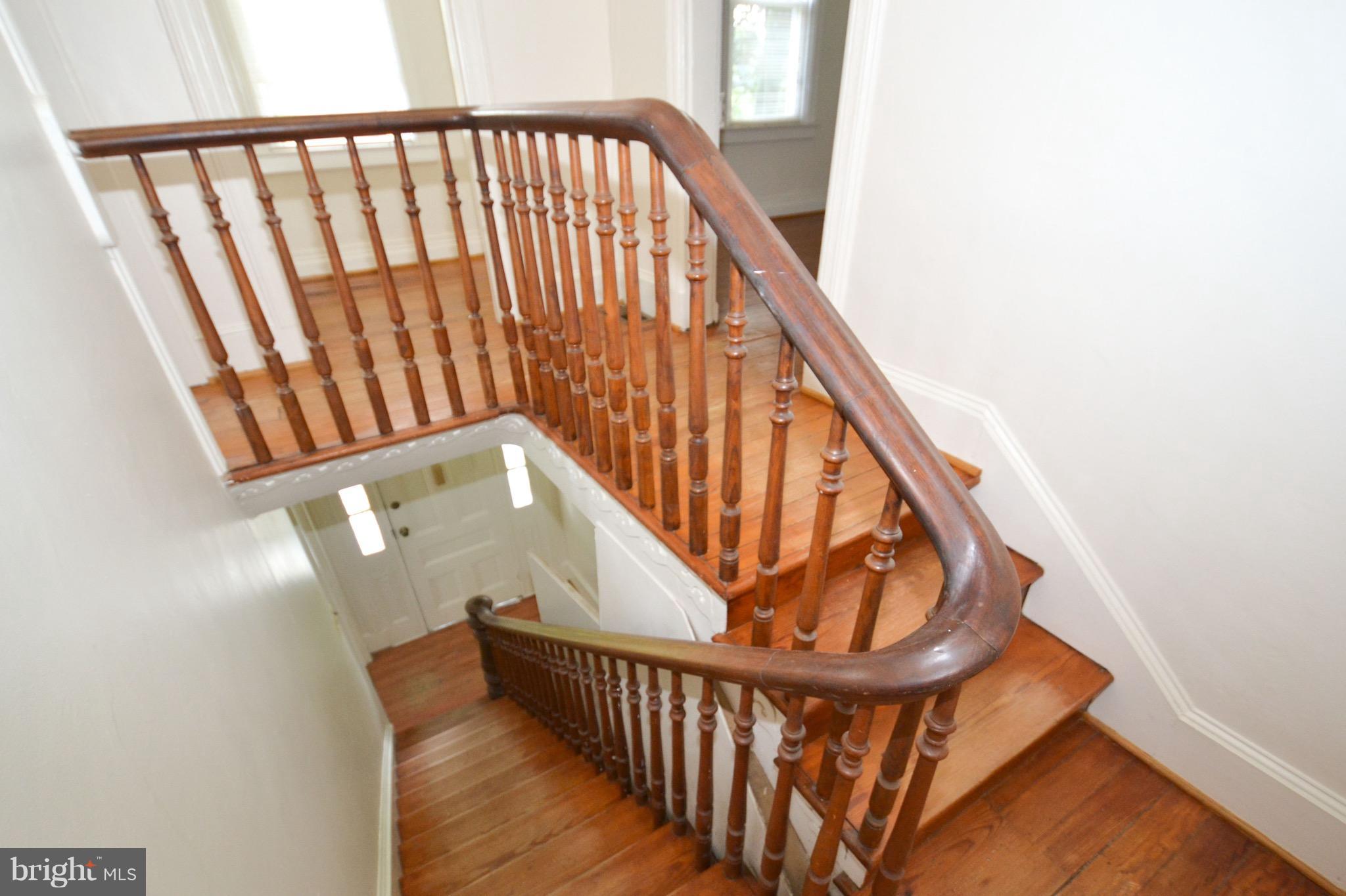 374 Jewell Road Dunkirk, MD 20754 - Photo 7 of 25 a view of staircase with railing and white walls