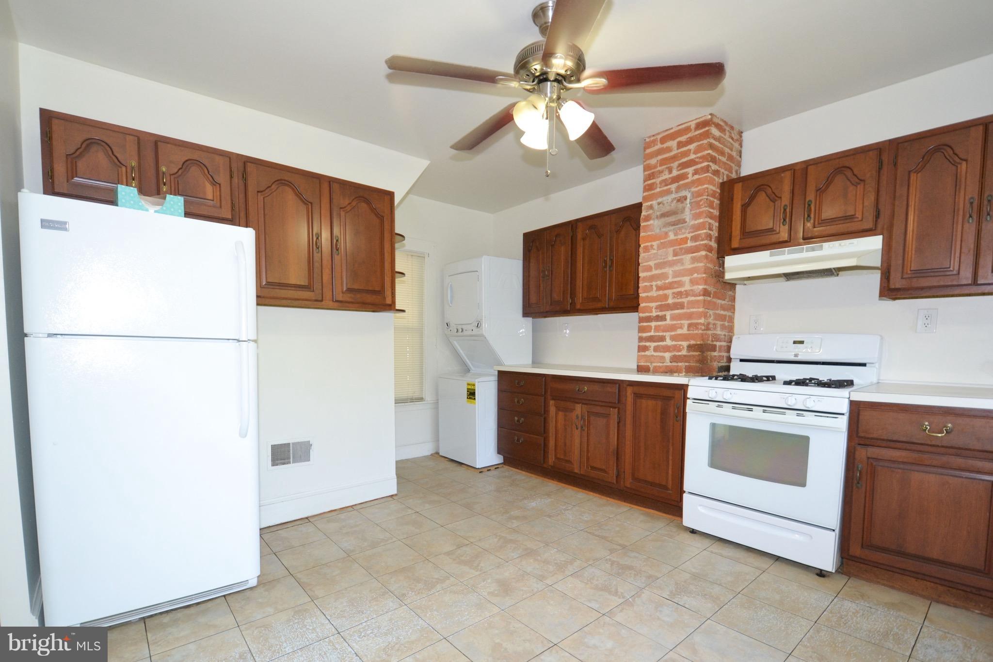 374 Jewell Road Dunkirk, MD 20754 - Photo 10 of 25 a kitchen with stainless steel appliances granite countertop a refrigerator a stove top oven a sink and dishwasher