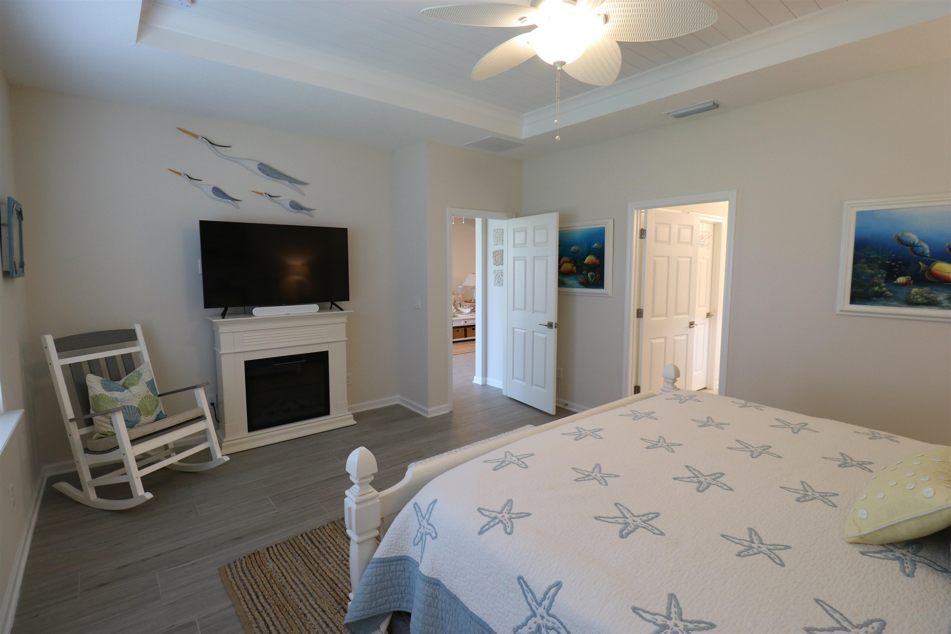 827 East Watson Road St. Augustine, FL 32086 - Photo 15 of 26 a spacious bedroom with a bed and a flat screen tv