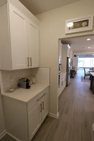 a kitchen with a sink and cabinets