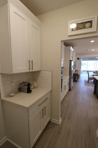 a kitchen with a sink and cabinets