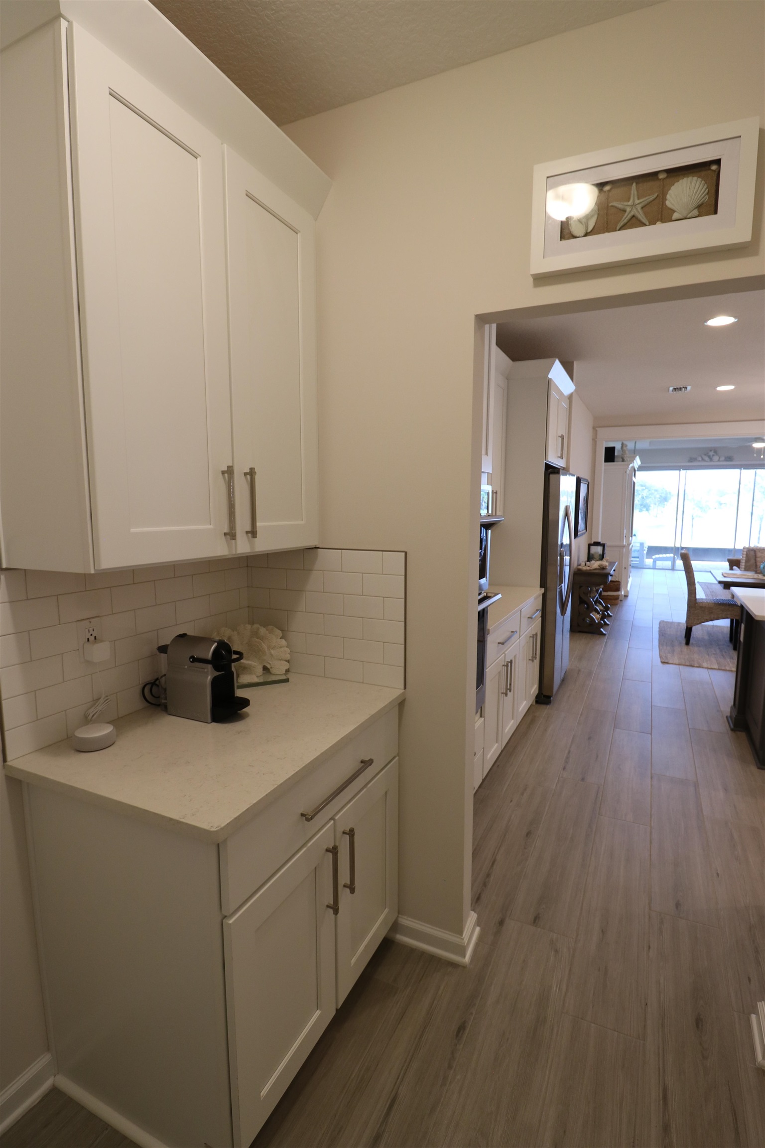 827 East Watson Road St. Augustine, FL 32086 - Photo 7 of 26 a kitchen with a sink and cabinets