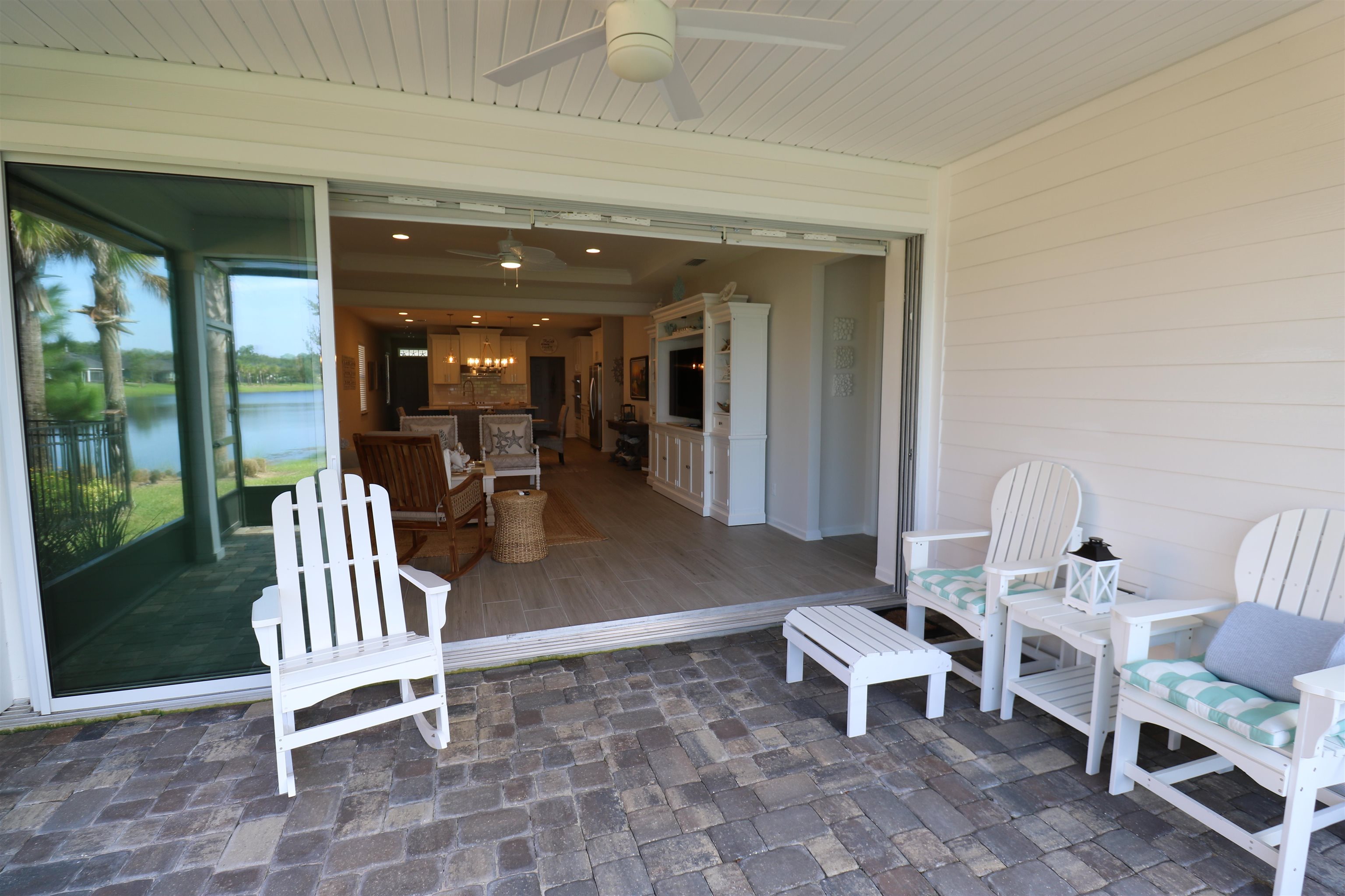 827 East Watson Road St. Augustine, FL 32086 - Photo 10 of 26 a living room with furniture and a garden