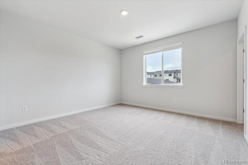 485 Interlocken Boulevard, Unit 210 Broomfield, CO 80021 - Photo 11 of 15 an empty room with a window
