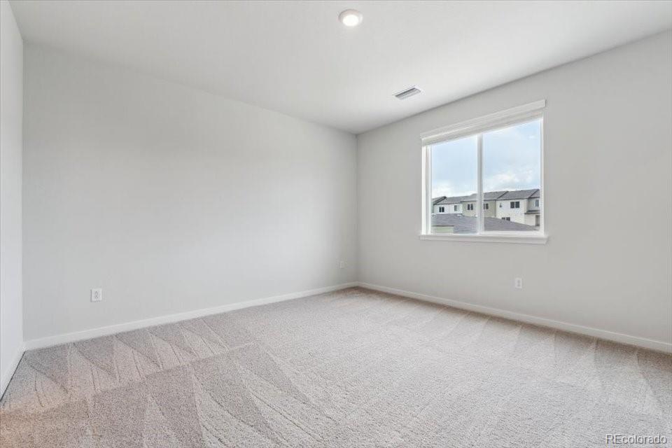 485 Interlocken Boulevard, Unit 210 Broomfield, CO 80021 - Photo 13 of 15 an empty room with windows