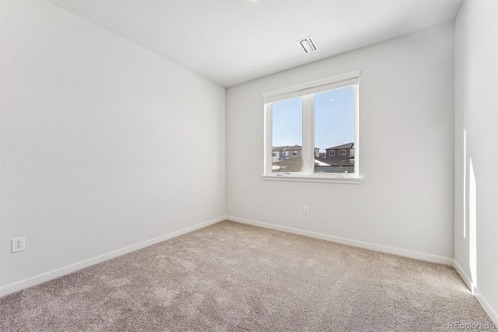 485 Interlocken Boulevard, Unit 210 Broomfield, CO 80021 - Photo 8 of 15 an empty room with windows