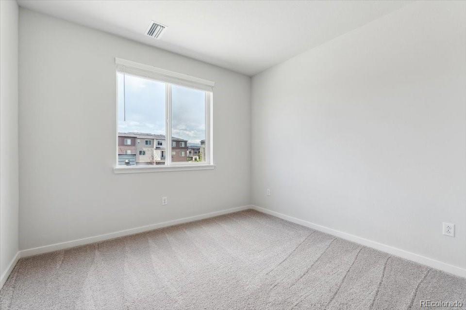 485 Interlocken Boulevard, Unit 210 Broomfield, CO 80021 - Photo 10 of 15 an empty room with windows
