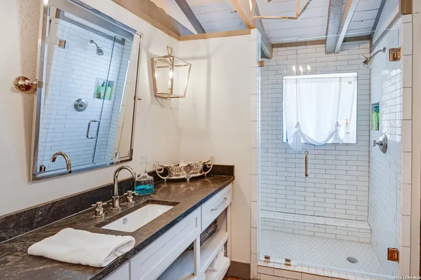 a view of a field of grass and mountain view