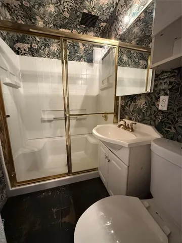 a bathroom with a sink and mirror