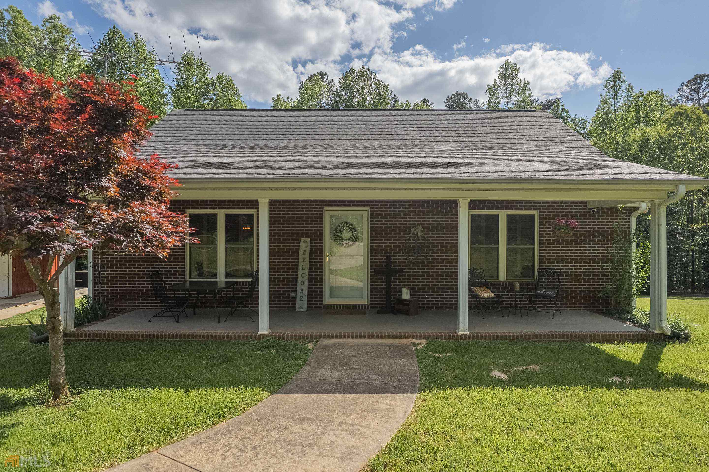 front view of house with a yard
