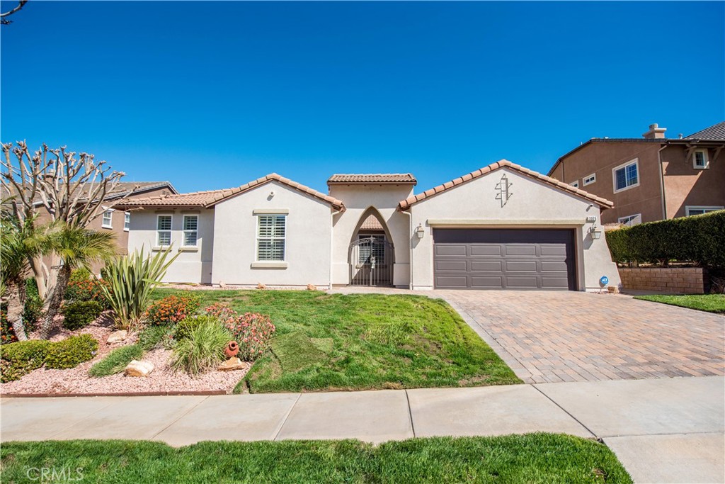 3325 Rural Circle Corona, CA 92882 - Photo 1 of 1 a front view of a house with garden