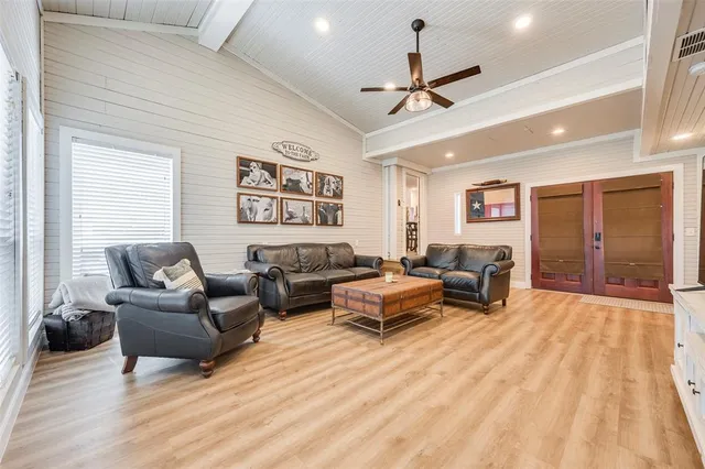 a living room with furniture and a rug