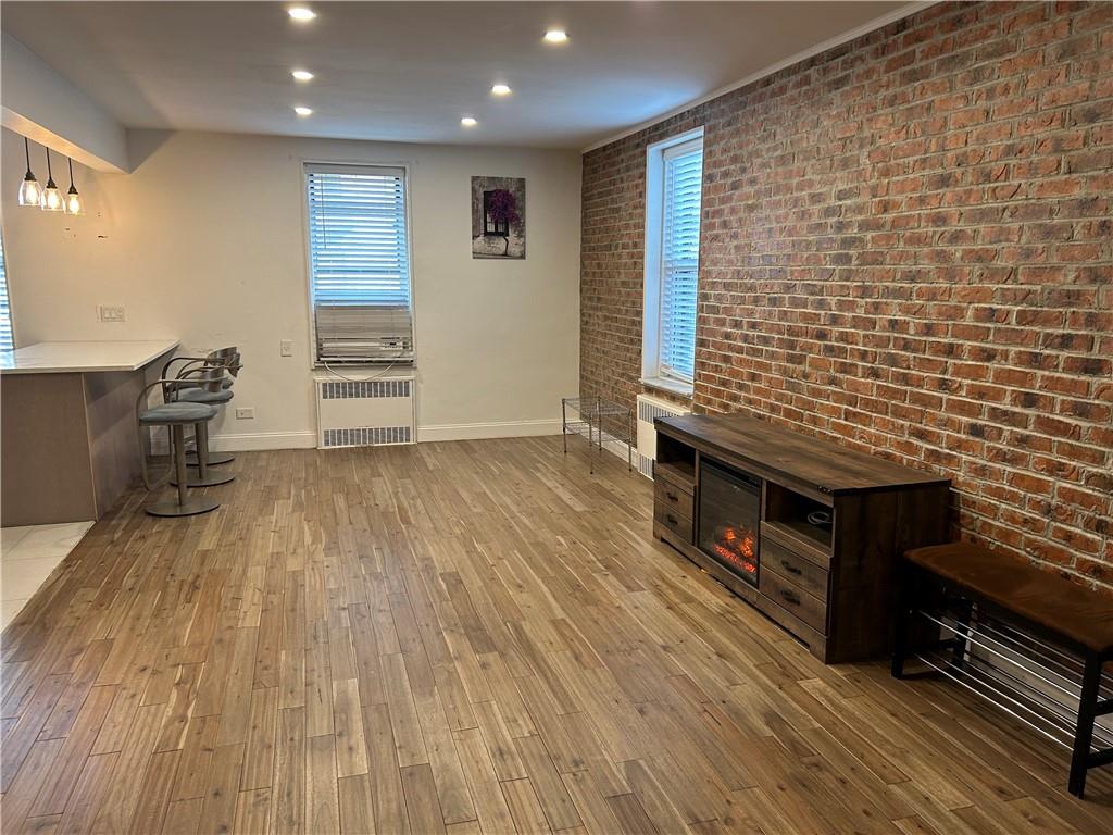 2232 Brigham Street, Unit 2K Brooklyn, NY 11229 - Photo 5 of 14 a view of livingroom with hardwood