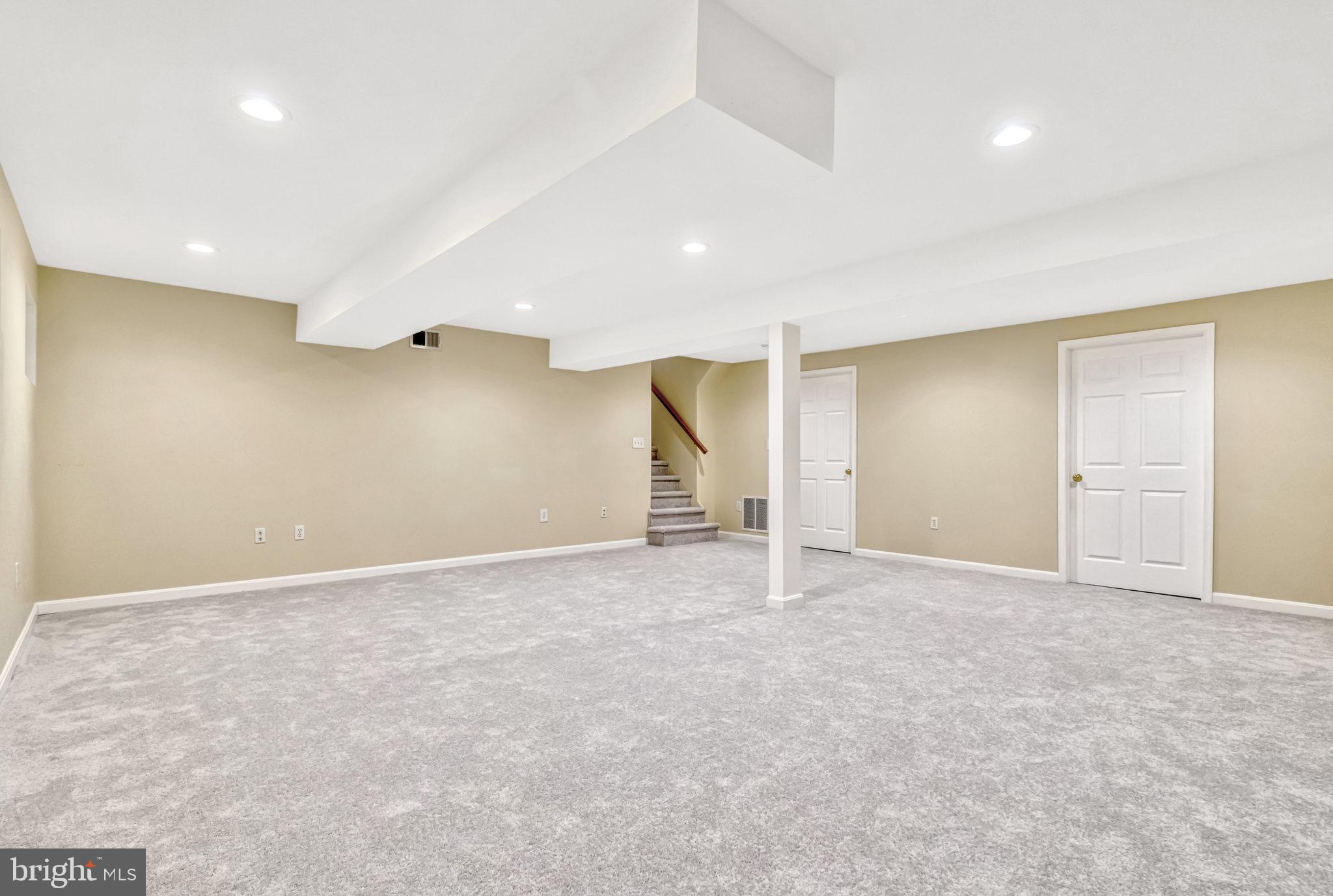 6306 Glenbard Road Burke, VA 22015 - Photo 23 of 47 LL rec room with new carpet and large storage