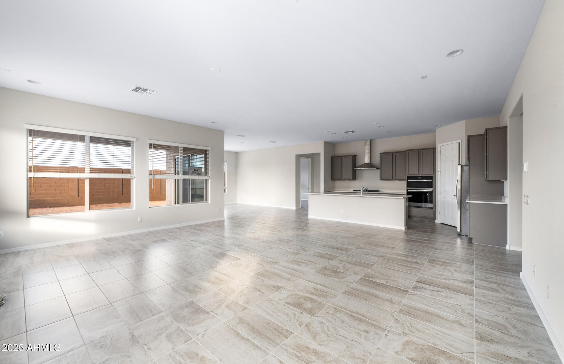 16092 West Red Bird Road Surprise, AZ 85387 - Photo 11 of 28 Gathering Room/Kitchen