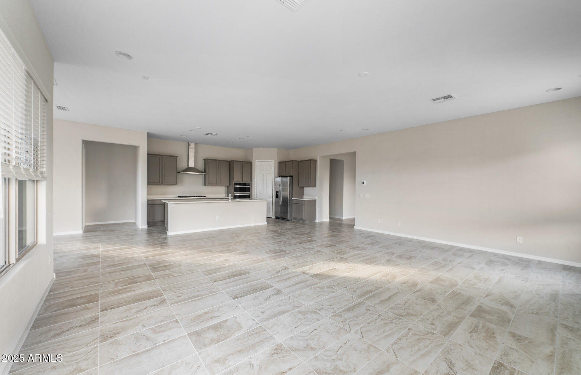 16092 West Red Bird Road Surprise, AZ 85387 - Photo 12 of 28 Gathering Room/Kitchen