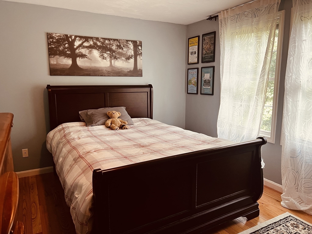 97 Breakneck Road Sturbridge, MA 01566 - Photo 26 of 33 a bedroom with a bed and window