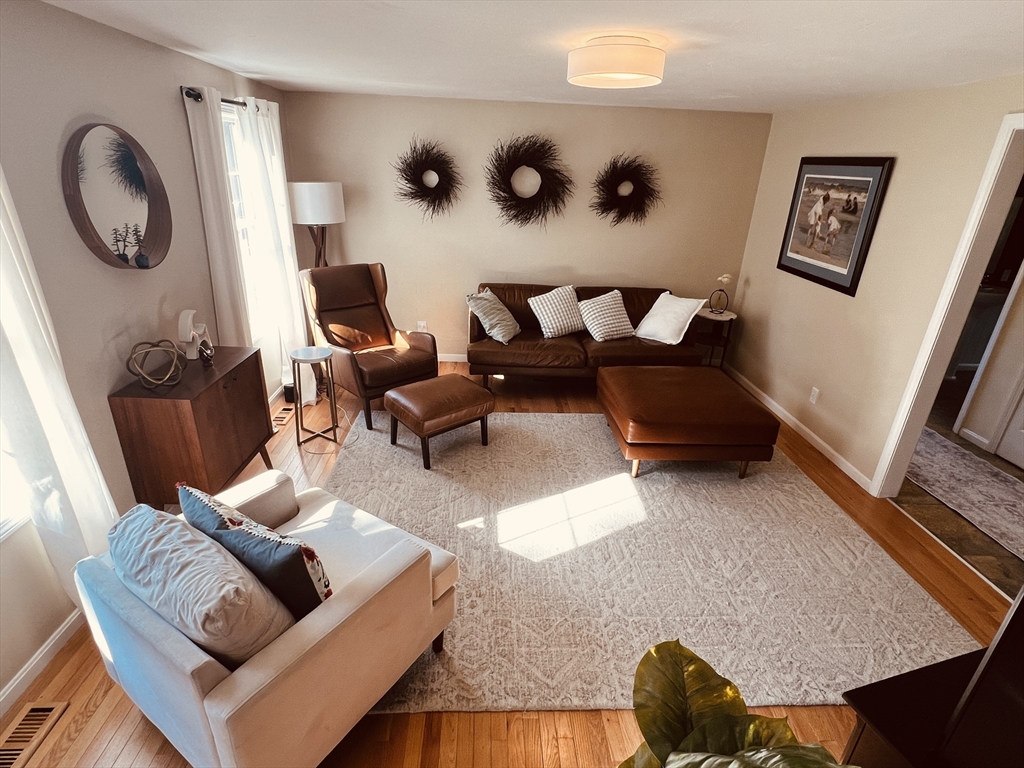 97 Breakneck Road Sturbridge, MA 01566 - Photo 3 of 33 a living room with furniture and a window