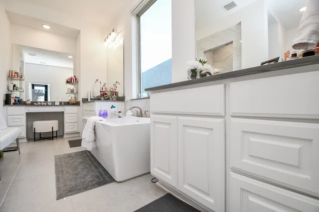 a bed room with a bed and a window