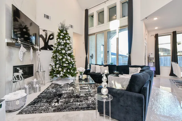 a view of a living room and entryway