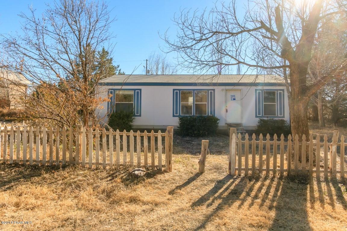 25375 North Stump Road Paulden, AZ 86334 - Photo 2 of 25 a front view of a house with a yard