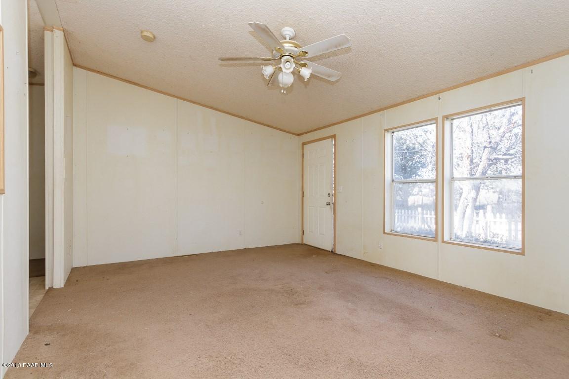 25375 North Stump Road Paulden, AZ 86334 - Photo 4 of 25 a view of an empty room with a window