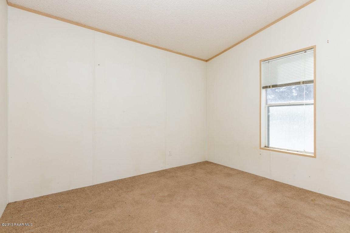 25375 North Stump Road Paulden, AZ 86334 - Photo 10 of 25 an empty room with windows and closet