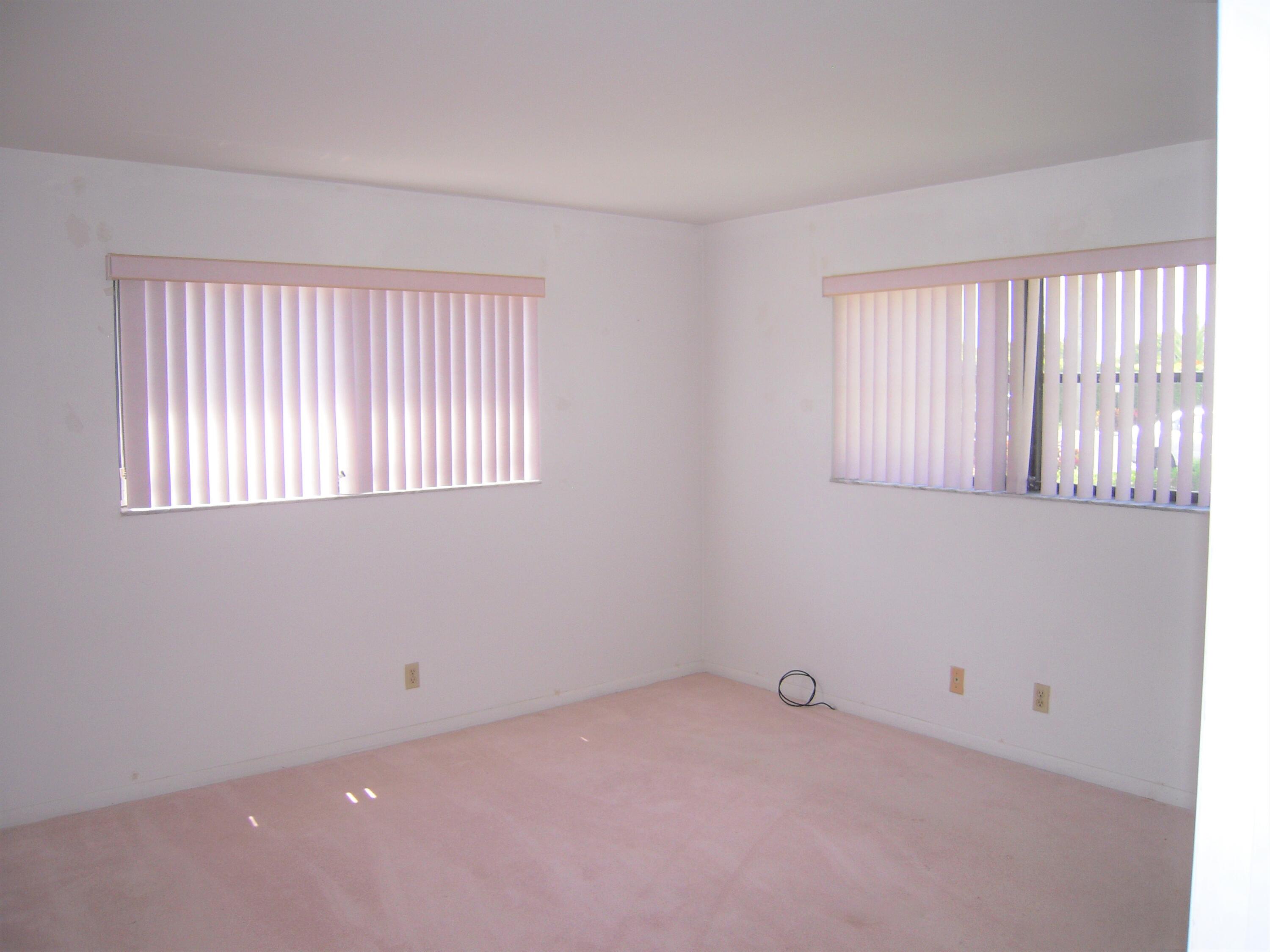 660 Dover Street, Unit A10 Boca Raton, FL 33487 - Photo 4 of 17 Master Bedroom