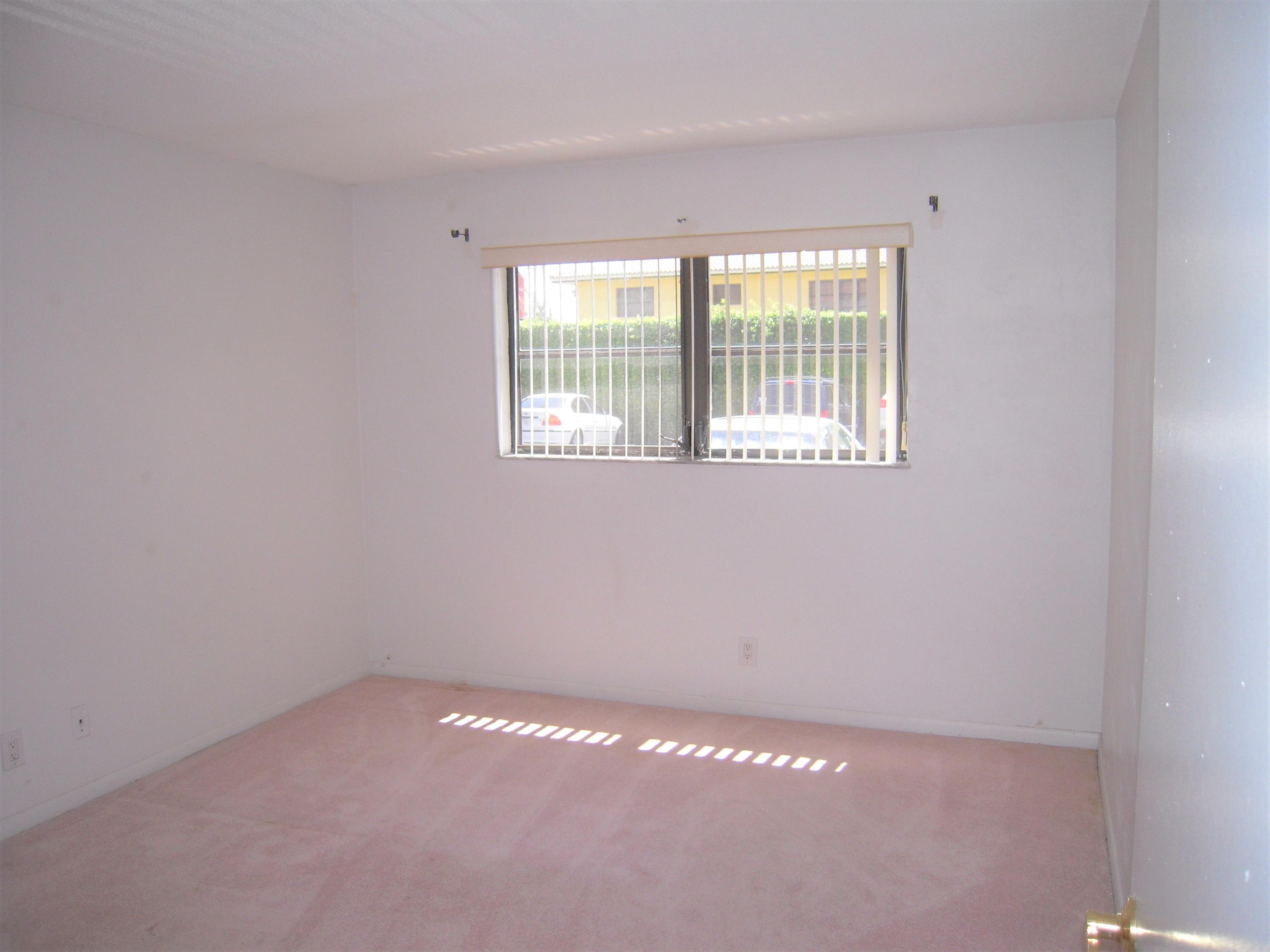 660 Dover Street, Unit A10 Boca Raton, FL 33487 - Photo 7 of 17 Guest Bedroom