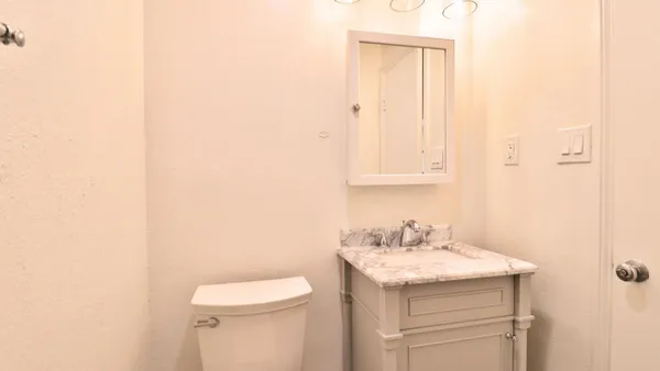a bathroom with a sink and a toilet
