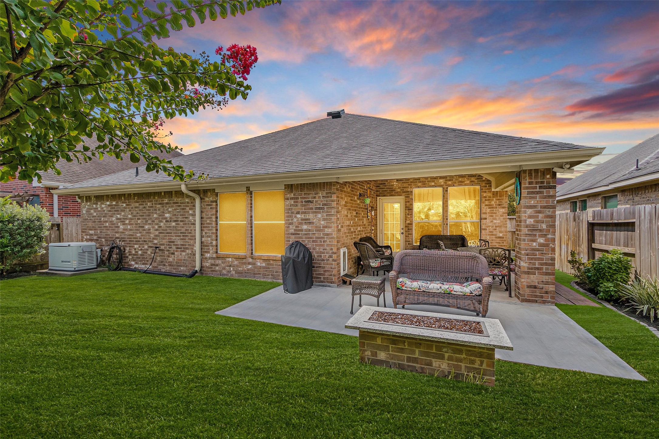 12310 West Elizabeth Shore Loop Cypress, TX 77433 - Photo 2 of 42 Covered and uncovered back patios with gas fire pit. Whole house gas generator included too!